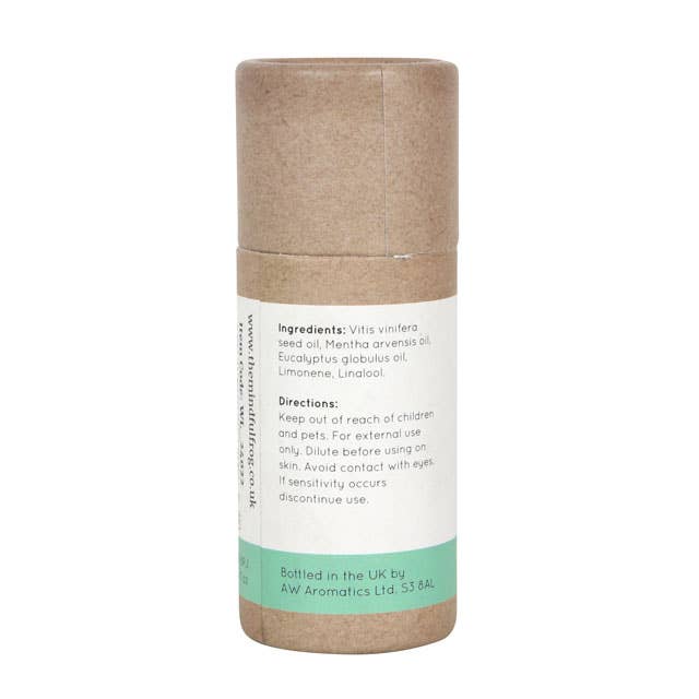 The back of a brown cardboard tube containing the "Breathe Easy" essential oil blend by The Mindful Frog. The label lists the ingredients, including Grape Seed Oil, Peppermint Oil, and Eucalyptus Oil. It also includes usage instructions and a warning to keep out of reach of children and pets.