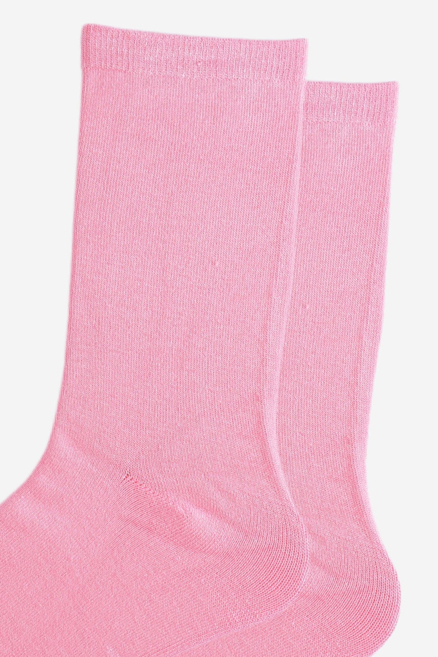 Close-up of two pink bamboo socks.