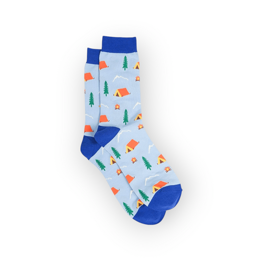 A pair of light blue bamboo socks featuring a campsite scene with tents and trees.