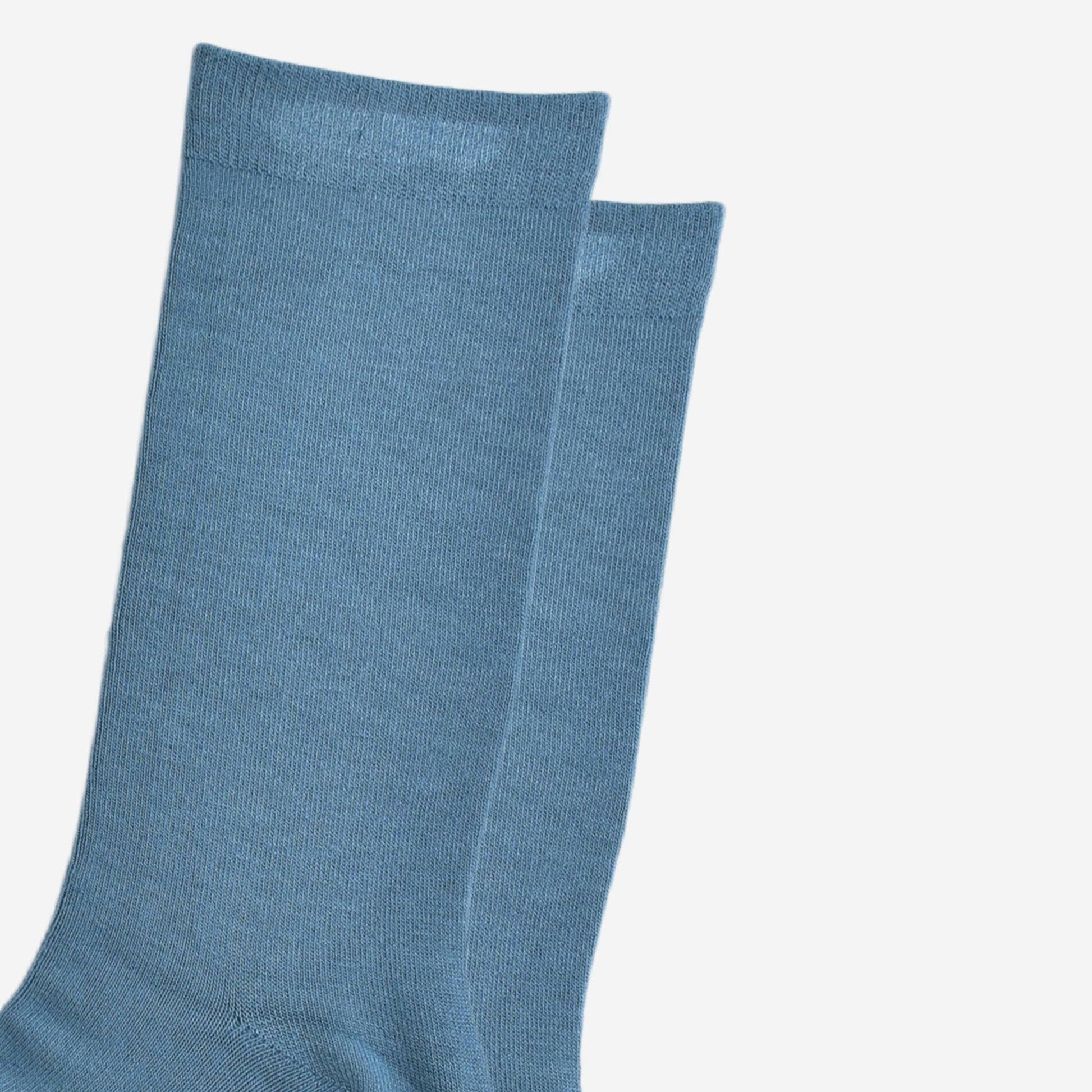 Close-up of teal bamboo socks showing texture and stitching