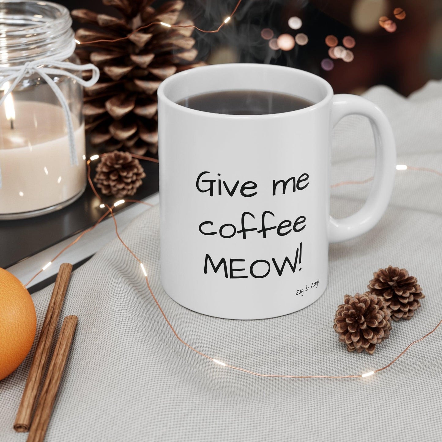 Close up of high-gloss finish on cat lover gift mug in a Christmas setting