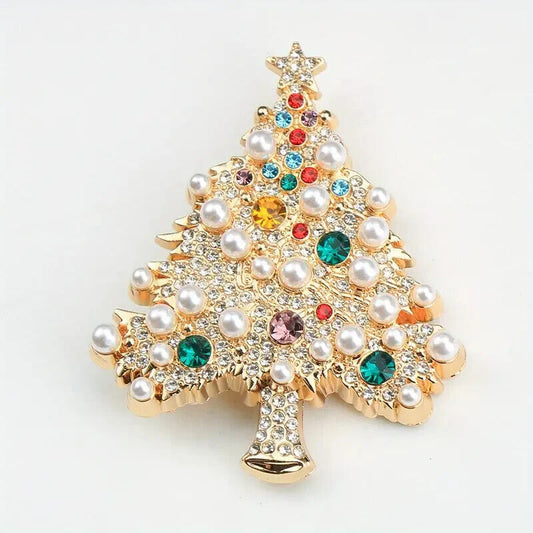 A gold-tone Christmas tree brooch adorned with colourful rhinestones and pearls.