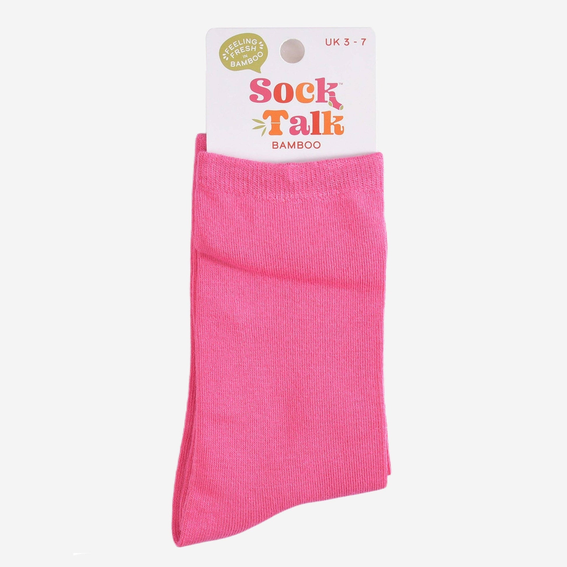 Sock Talk Women’s hot pink bamboo ankle socks displayed flat with packaging on a white background.