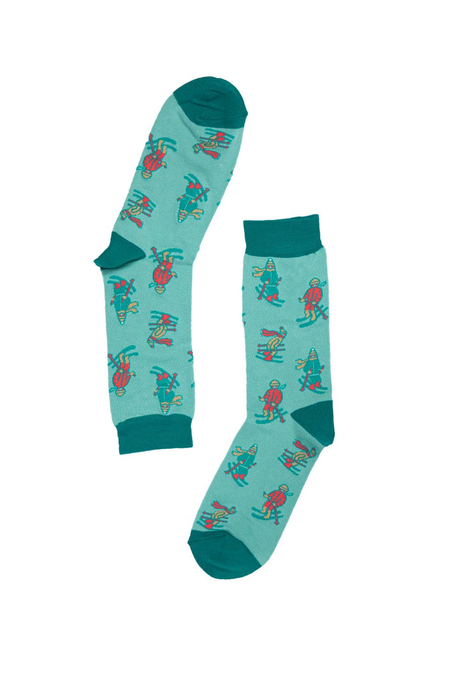Two teal bamboo crew socks with a pattern of cartoon skiers in red, yellow, and blue. The skiers are wearing hats and scarves and are holding ski poles.