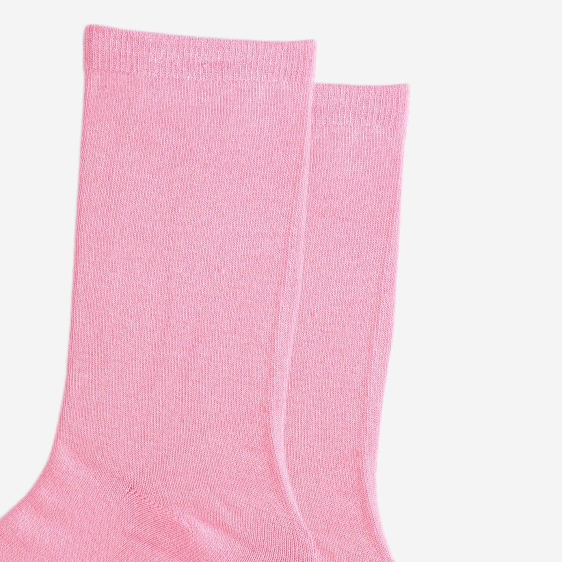 Women’s light pink bamboo ankle socks cuff details displayed flat on a white background.