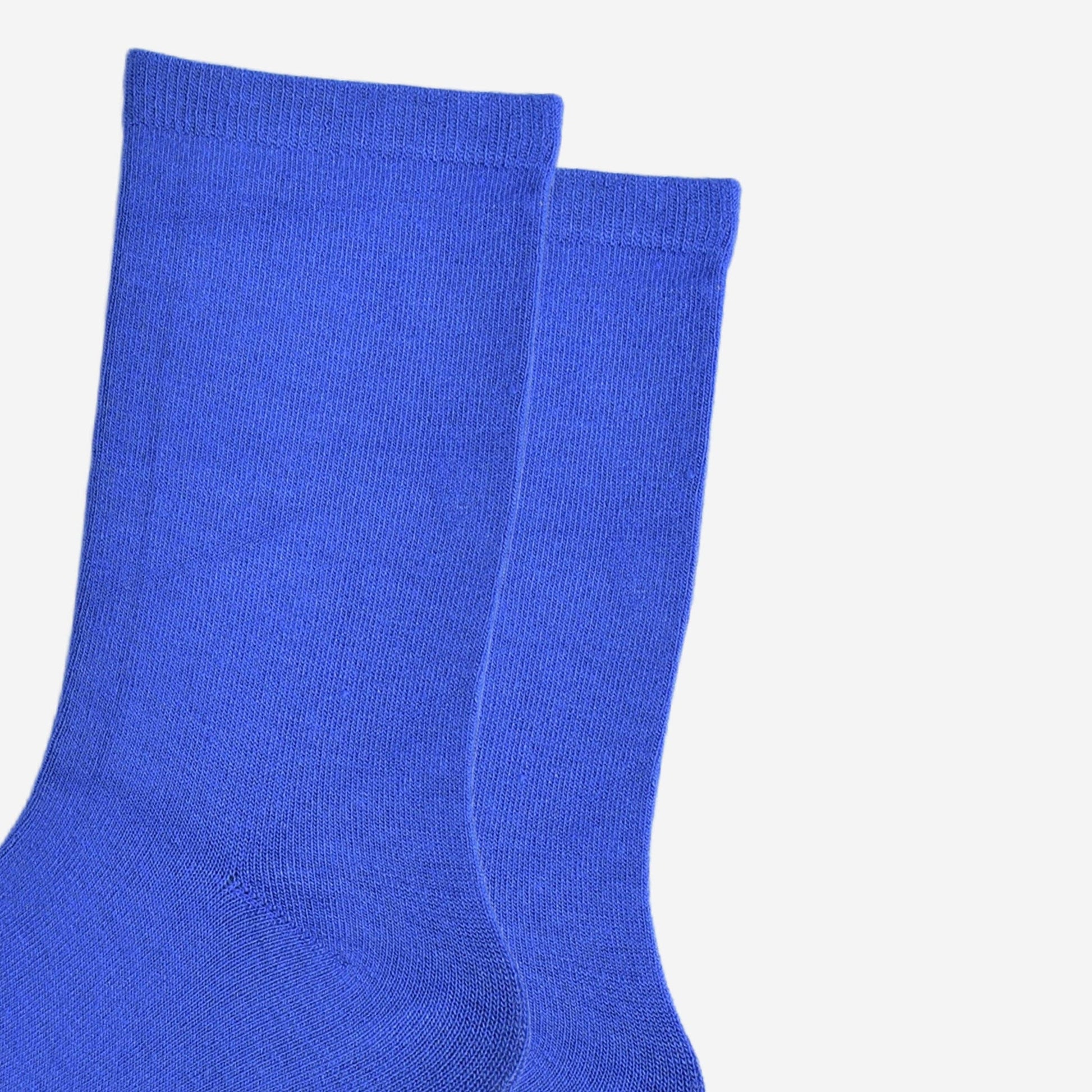 Women’s royal blue bamboo ankle socks cuff detail displayed flat on a white background.