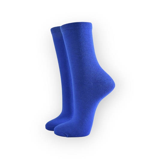 A pair of women's royal blue bamboo socks, positioned in a standing manner on a white background.