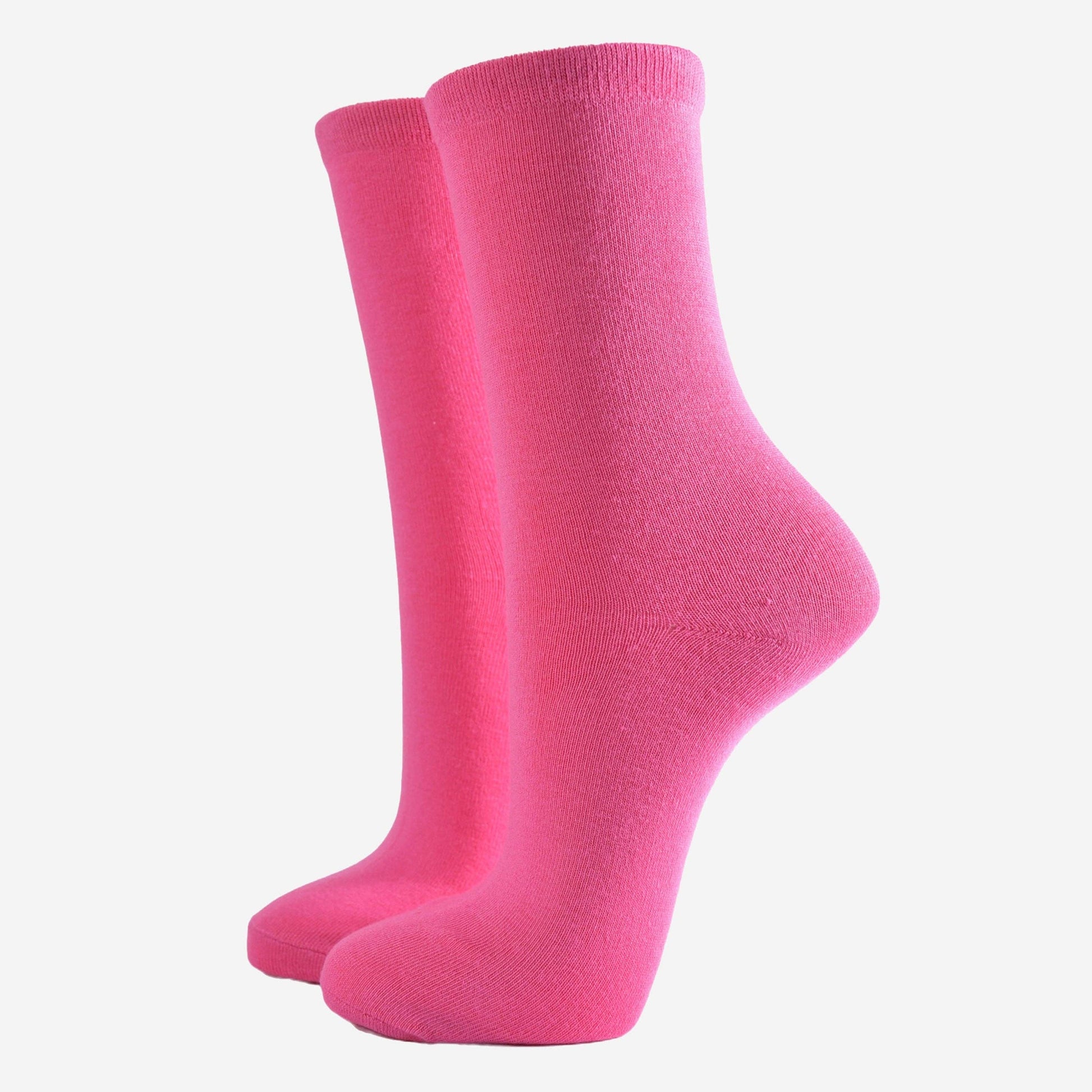 Women’s hot pink bamboo ankle socks displayed flat on a white background.