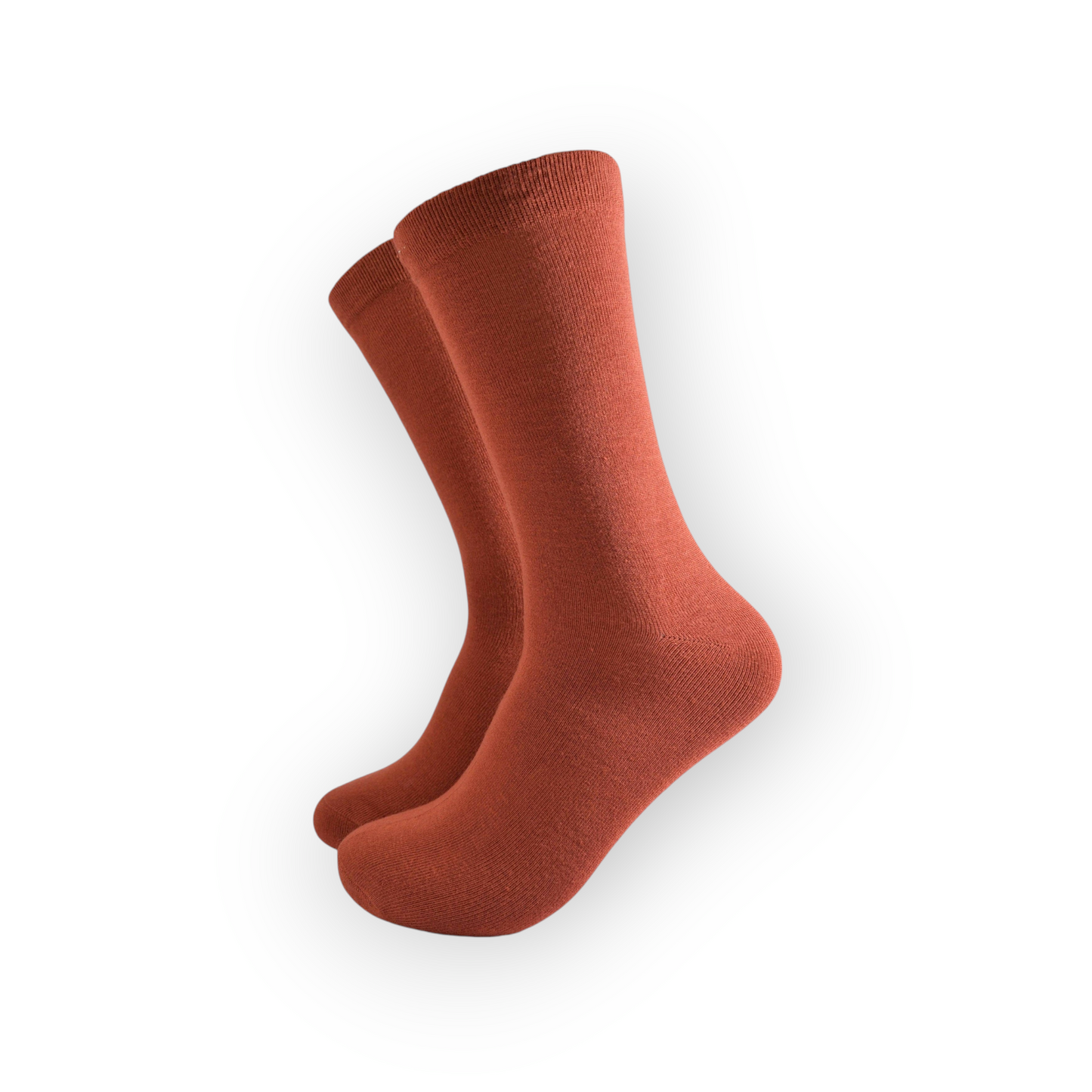 A pair of rusty orange bamboo socks with a visible textured knit pattern, designed for men.