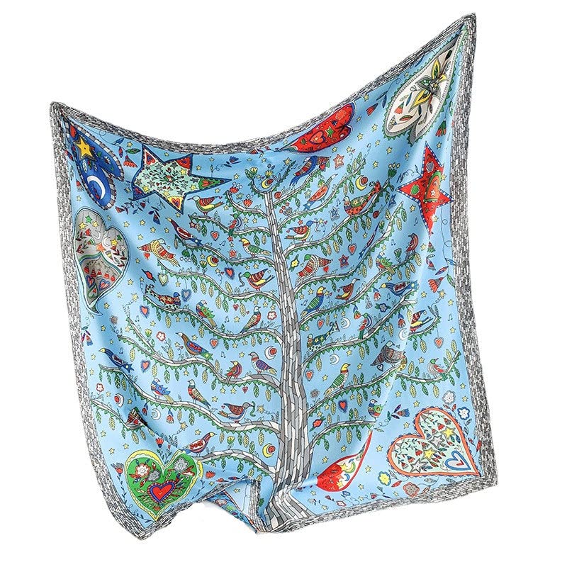 Colorful scarf with tree and bird design on a white background