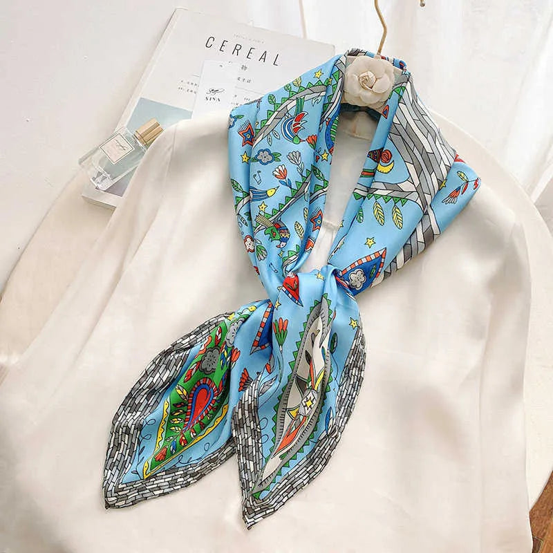 Colourful scarf with tree for life design on a white surface